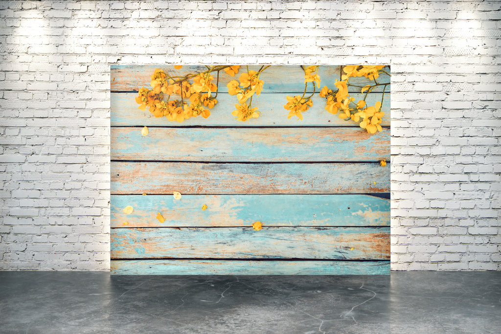 Yellow Flowers On Wood